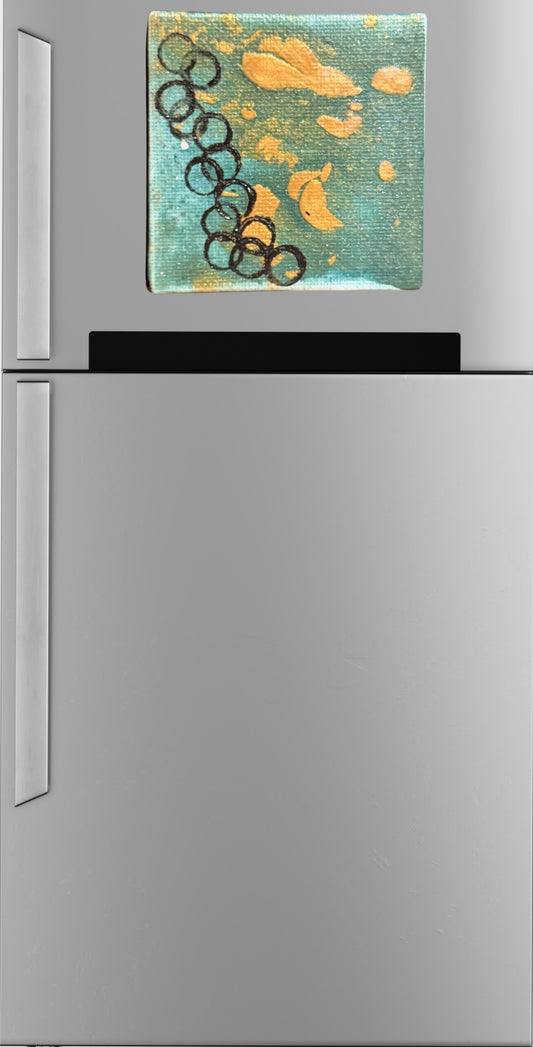 Circled Marble art magnet with a teal and gold background and overlapping black circles