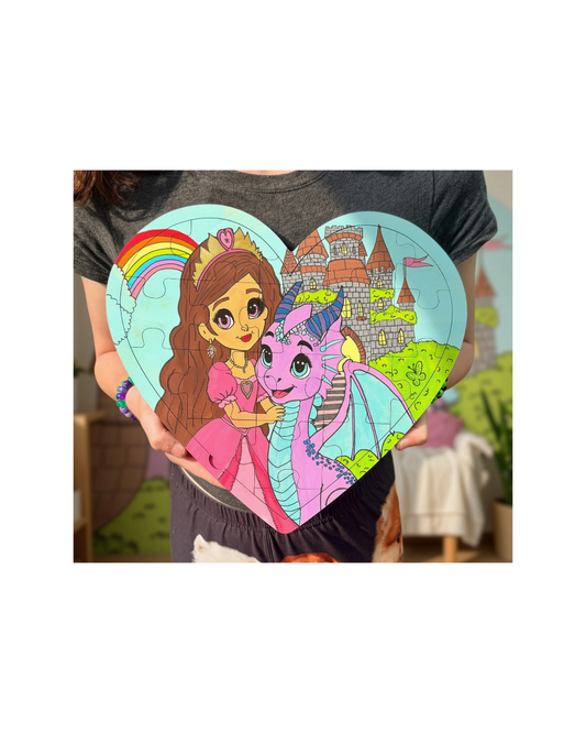 Princess heart-shaped hand-painted puzzle featuring a princess, pink dragon, castle and rainbow